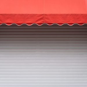 white-stall-with-red-sunshade.jpg